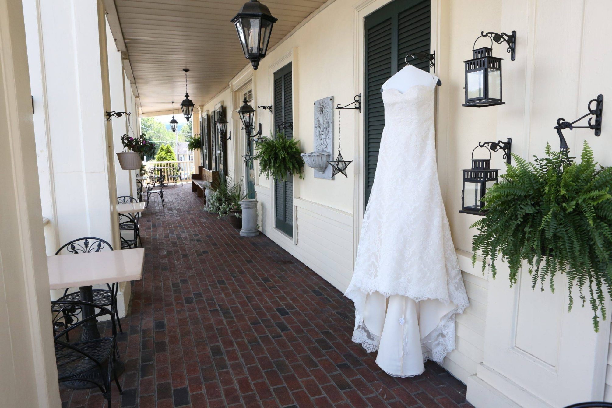 David’s Country Inn wedding dress on front porch