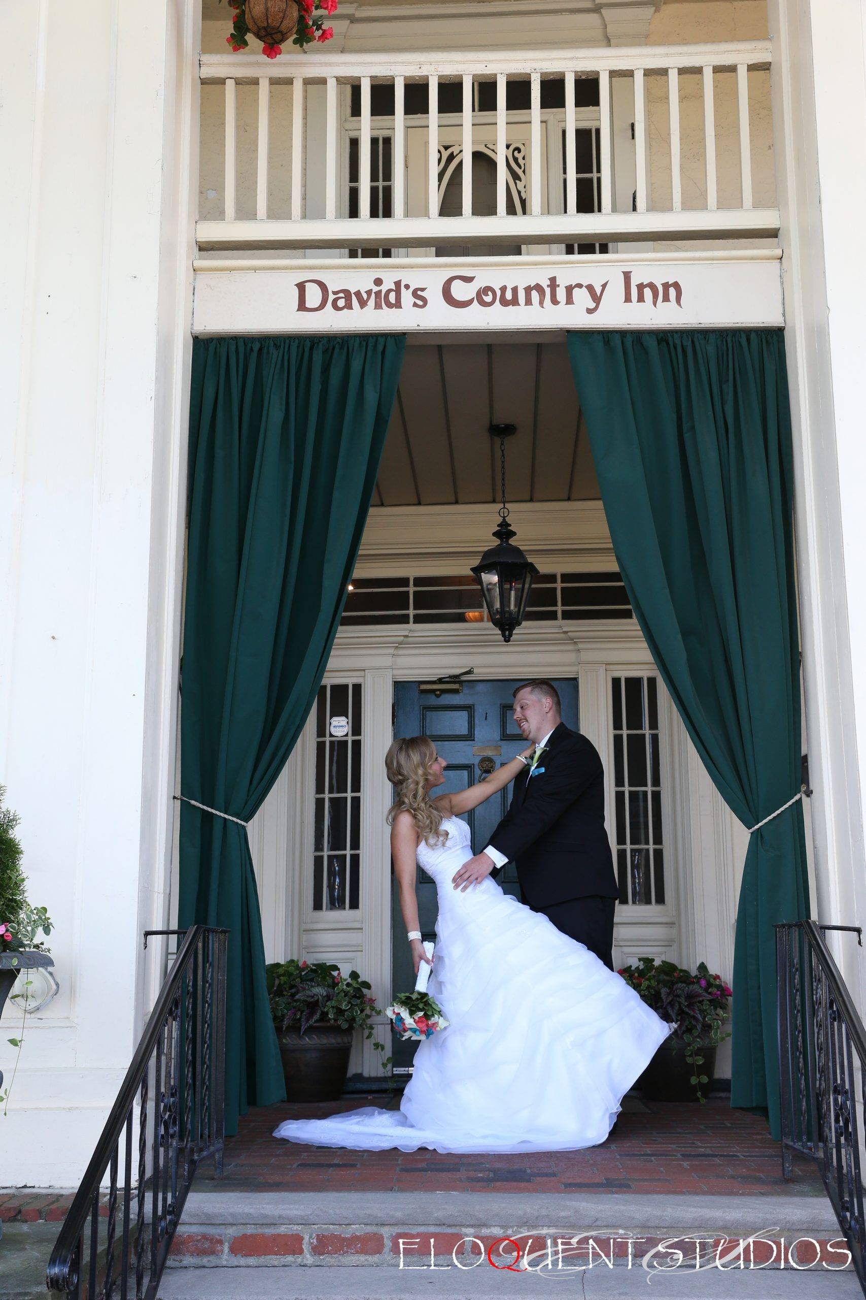 David’s Country Inn bride and groom at front door