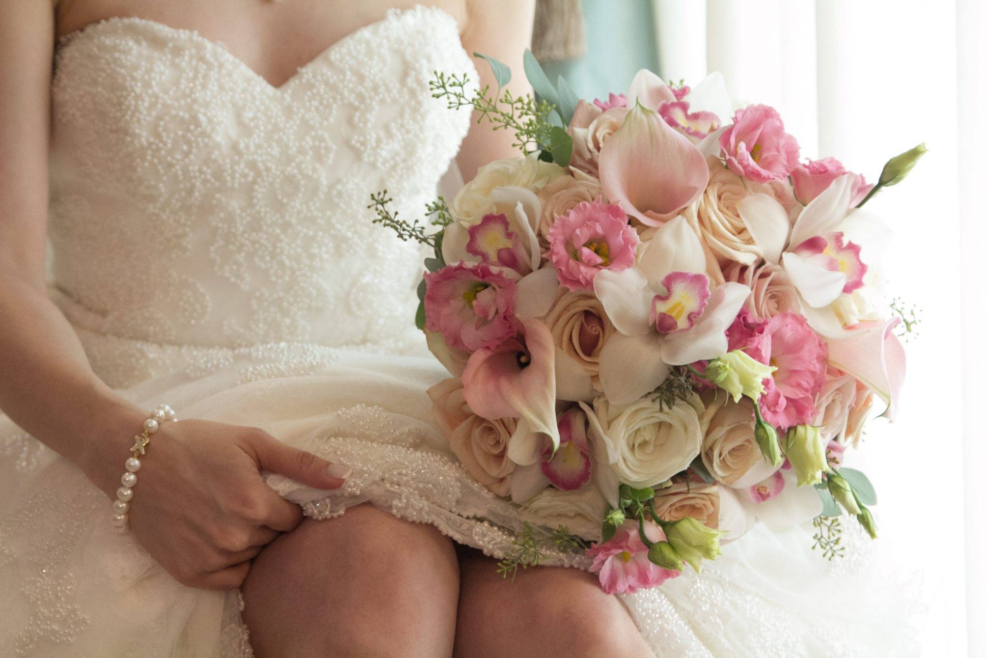 Brooklake seated bride with bouquet