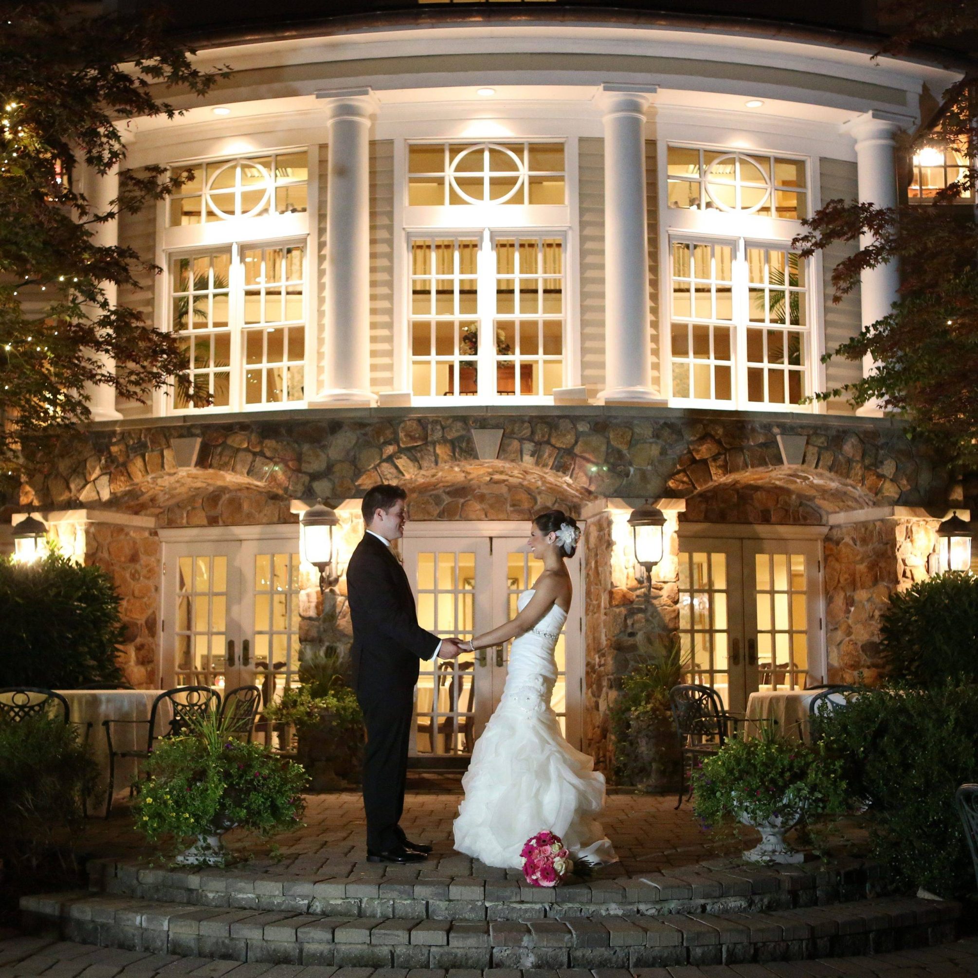 Olde Mill Inn bride and groom outside at night