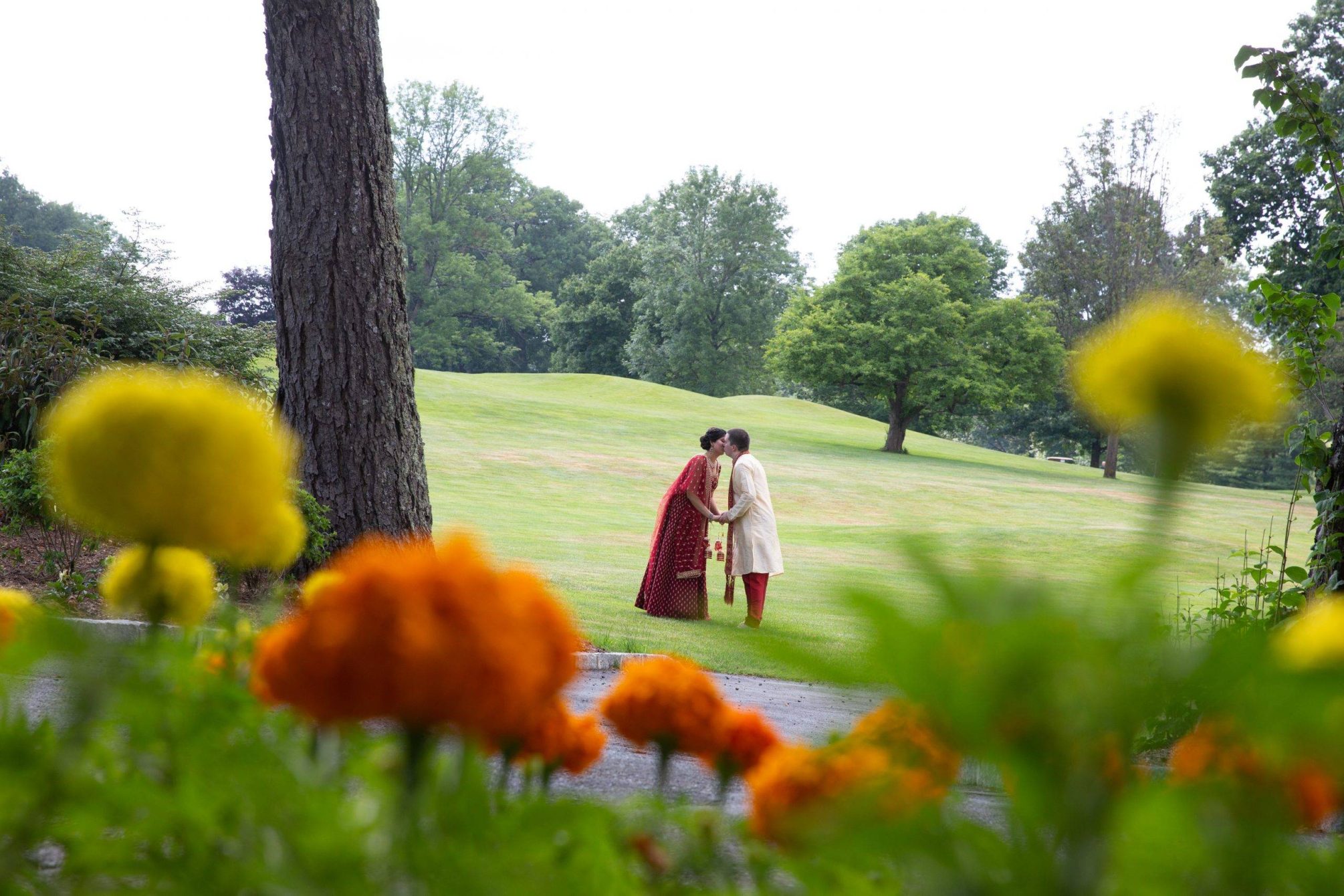 Brooklake Indian bride and groom in gardens