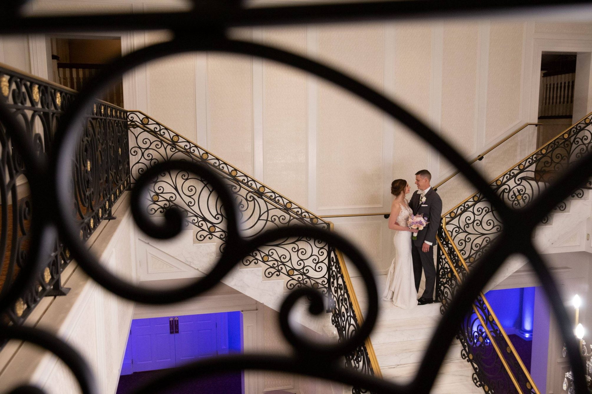 Meadow Wood bride and groom on staircase from above