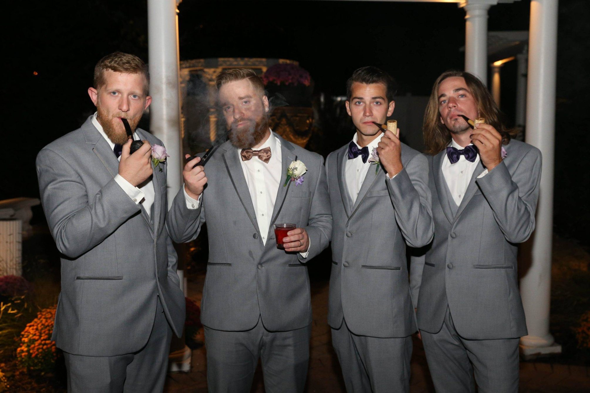 Primavera Regency groom and groomsmen smoking pipes