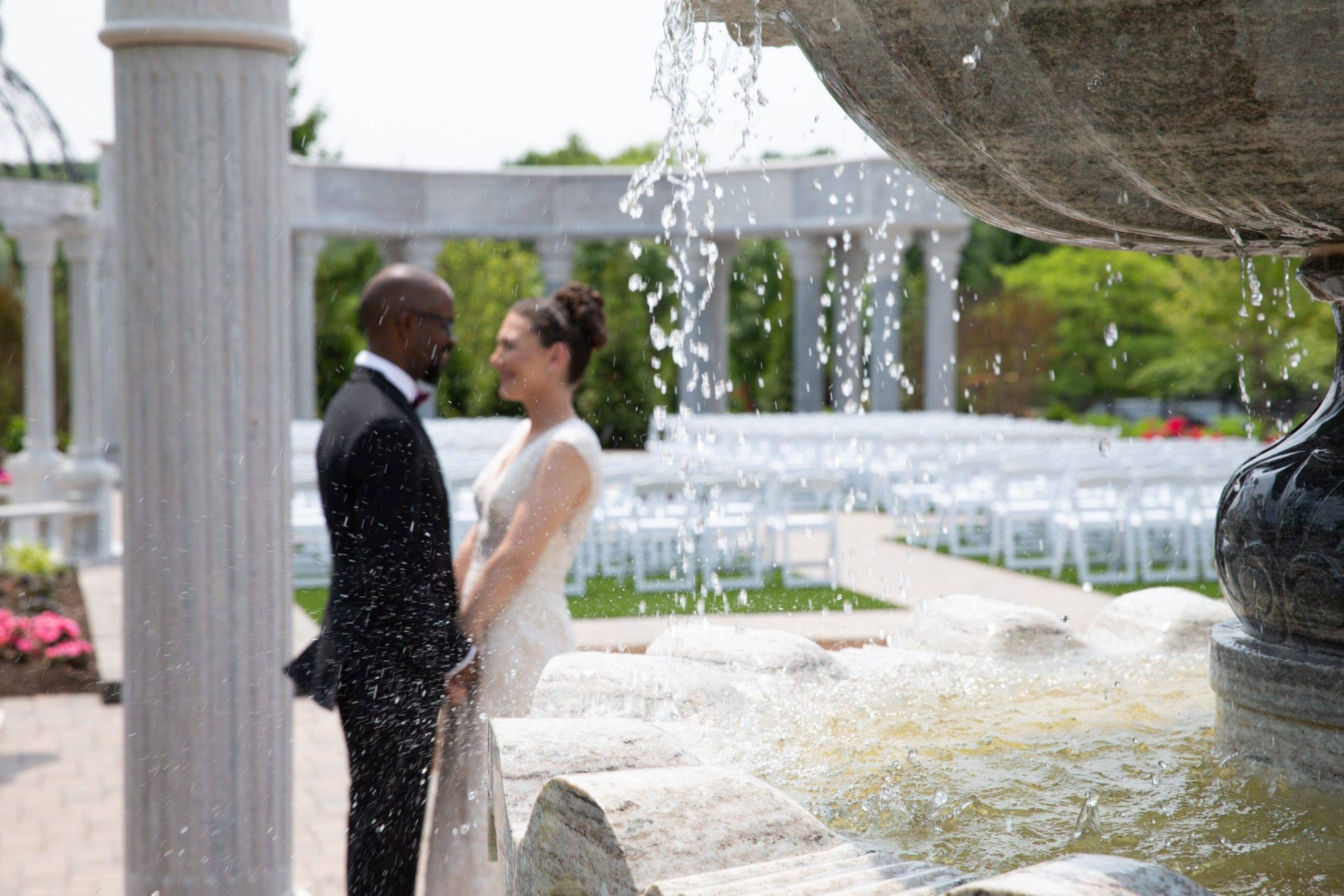 Meadow Wood wedding couple outside by columns