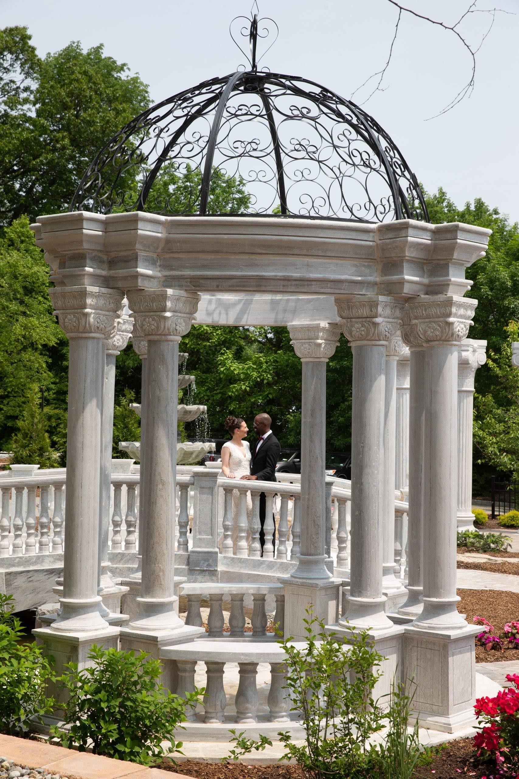 Meadow Wood wedding couple on patio by columns