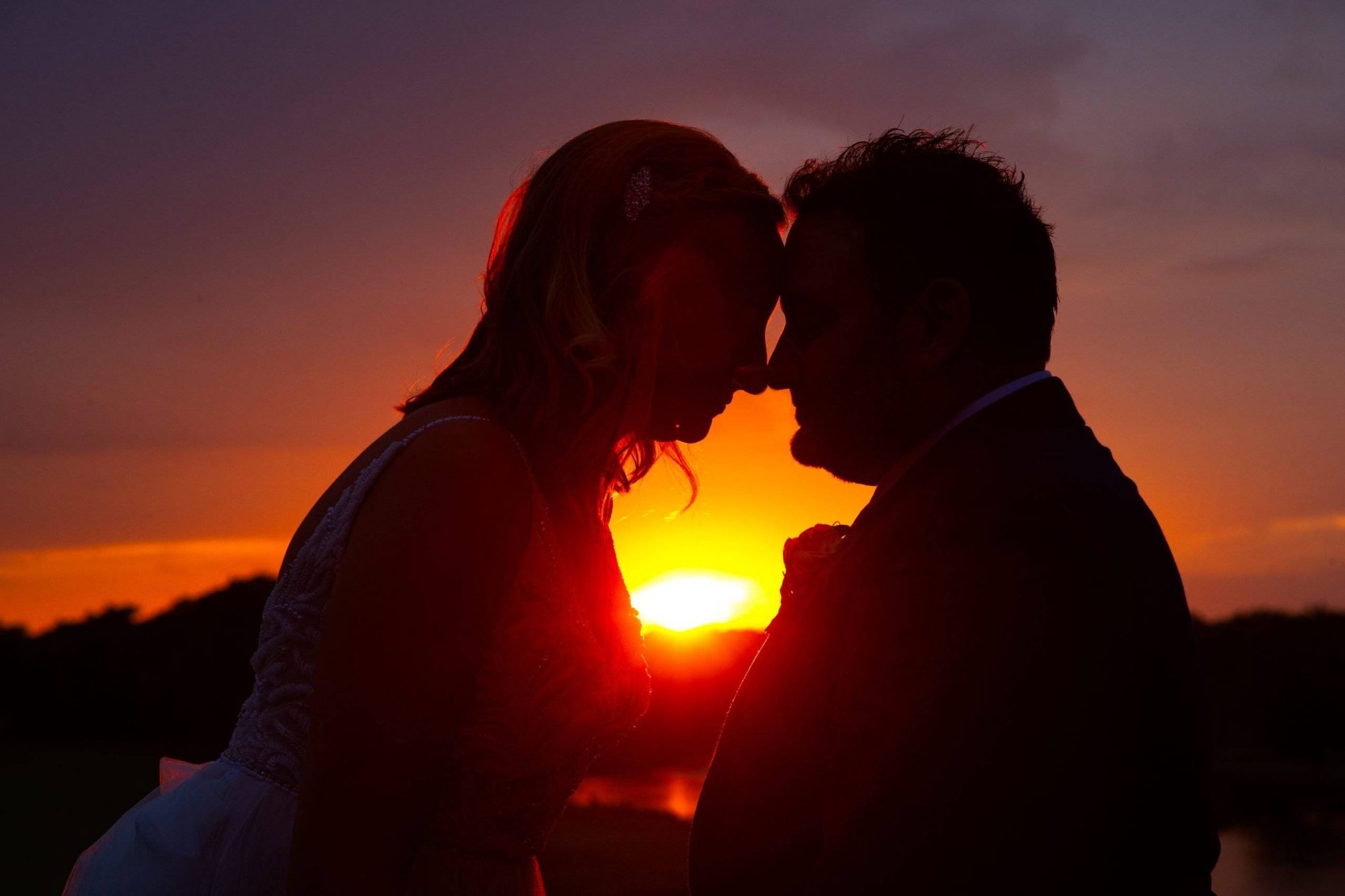 Brooklake bride and groom by sunset