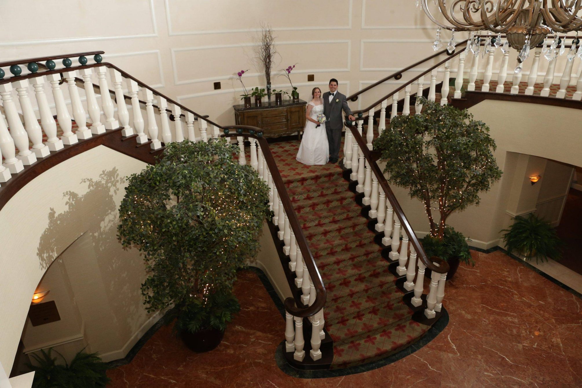 Bridgewater Manor wedding couple on staircase from above
