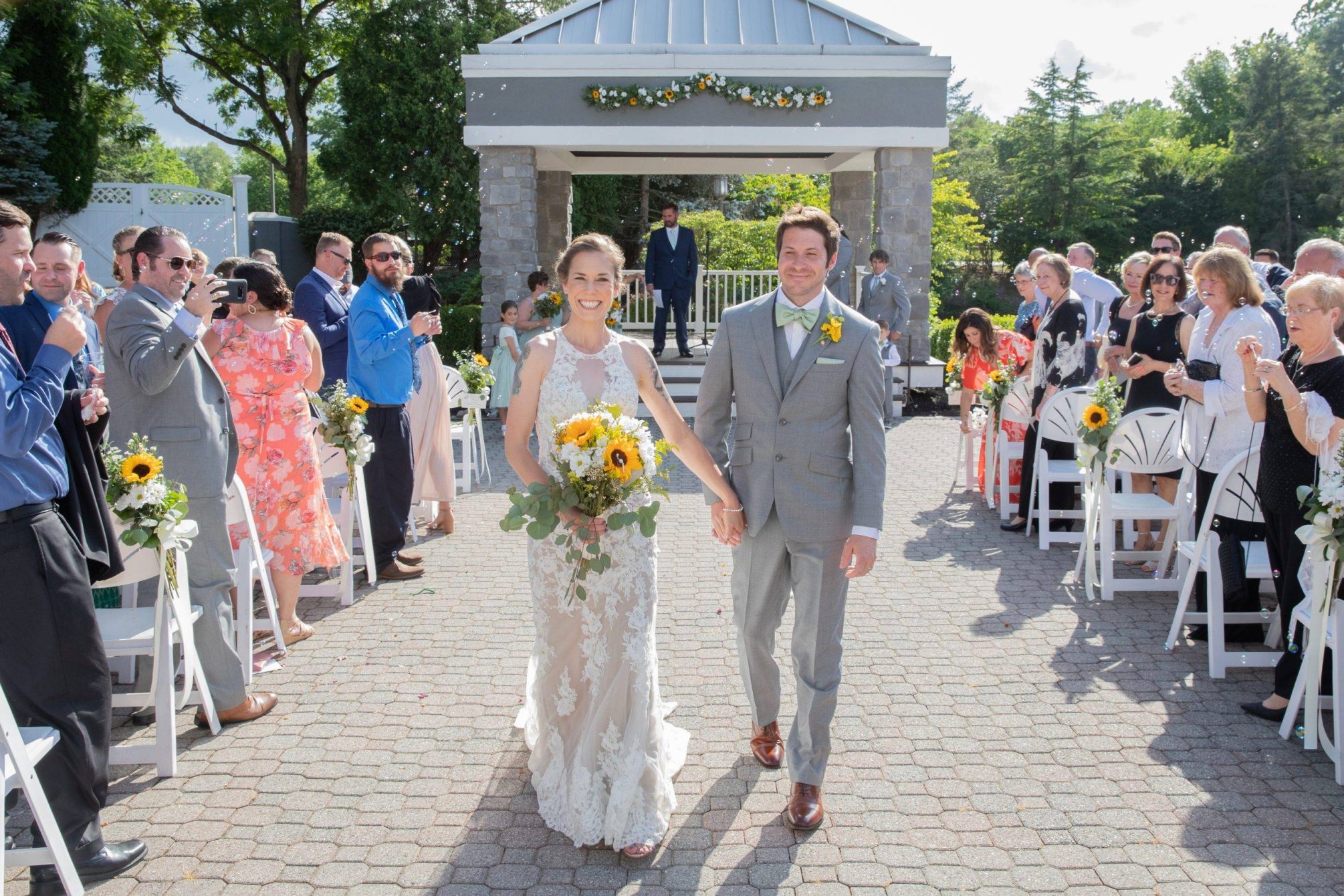 Bridgewater Manor bride and groom in outdoor wedding ceremony